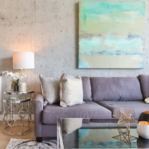 A modern living room setup staged with contemporary accessories, art and lighting.